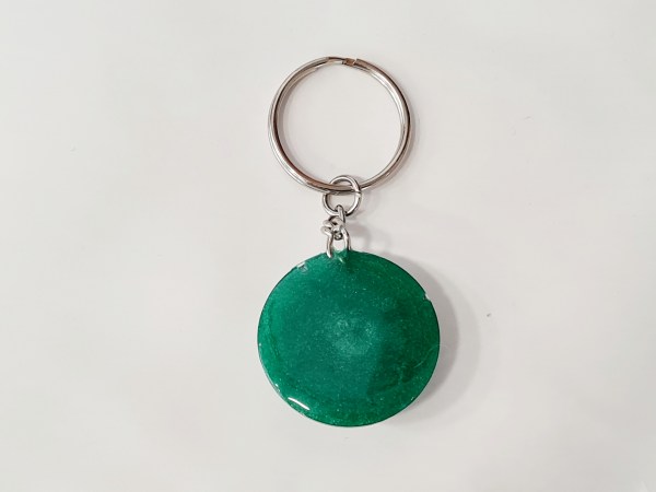 porte clé orgonite rond vert graine de vie